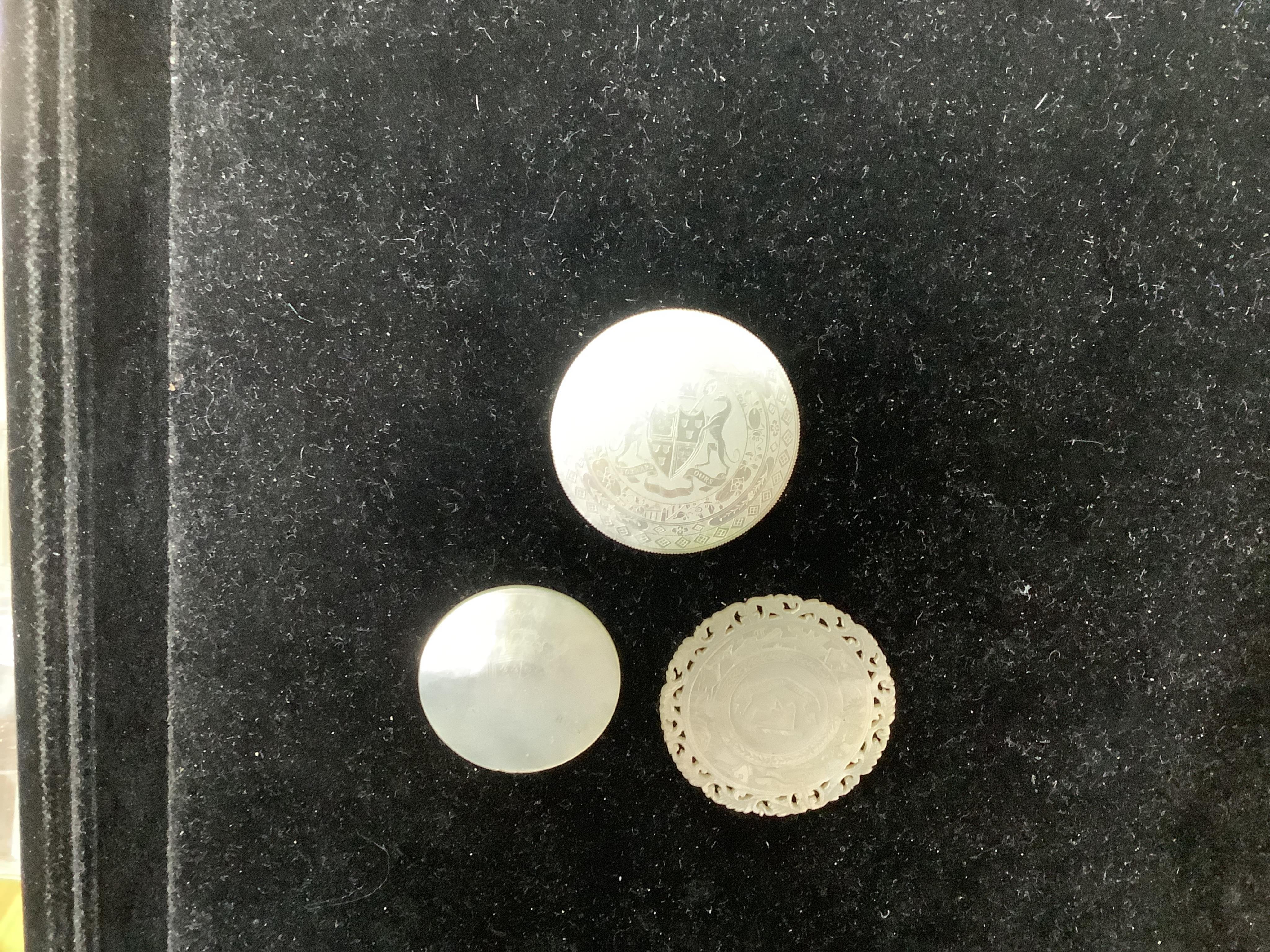 An extensive collection of Chinese mother of pearl gaming counters, in an album. Condition - the majority of the counters in good condition, occasional examples with tiny splinter edge chips